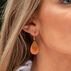 Anju Womens Gold Swivel Orange Layered Brass Patina Earring